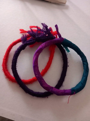 Set of bracelets made of threads and fabric like new