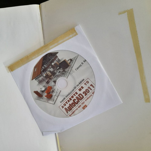 Work with AutoCAD 2011 book with minor cover damage, includes CD