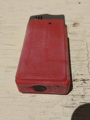 Ronson butane gas lighter used, red