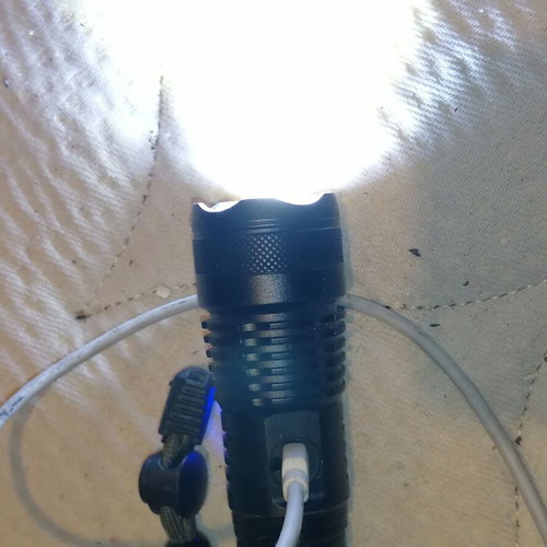 Professional flashlight with 4 lighting levels and USB new