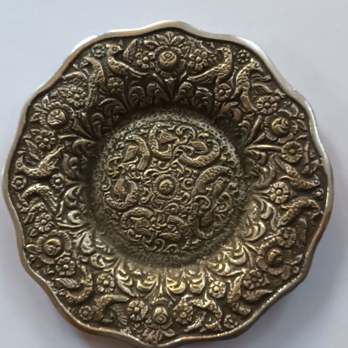 Silver-plated ashtray used, cast brass with decorative peacocks