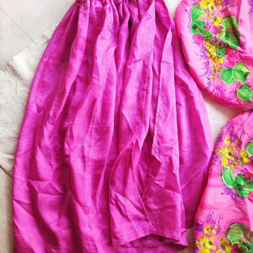Window curtain and two chair covers used, pink