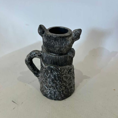 Vintage animal figure candle holder with green eyes, resin