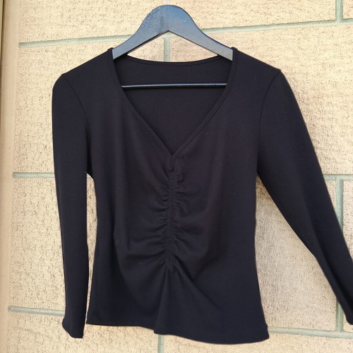 Black long-sleeve top, thin fabric