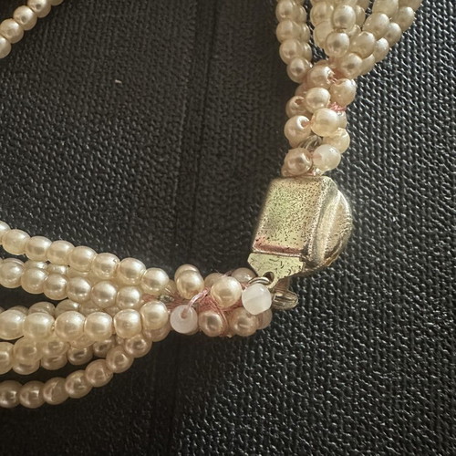 Vintage multi-strand pearl bracelet with cabochon clasp