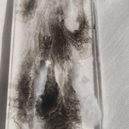 Handmade bookmark from white and black resin like new