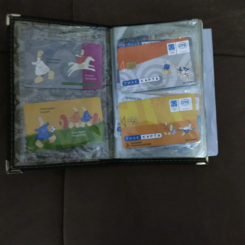 Collectible old phone cards with album used