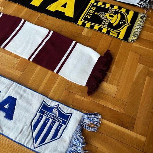 Collection of used football scarves, beanie and shirt set