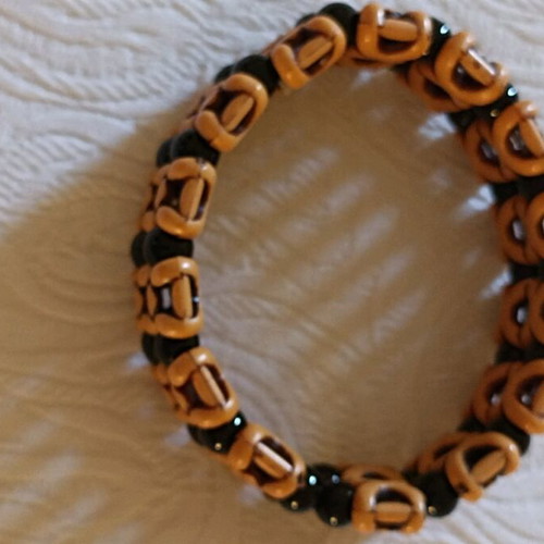 Elastic bracelet like new in black and brown
