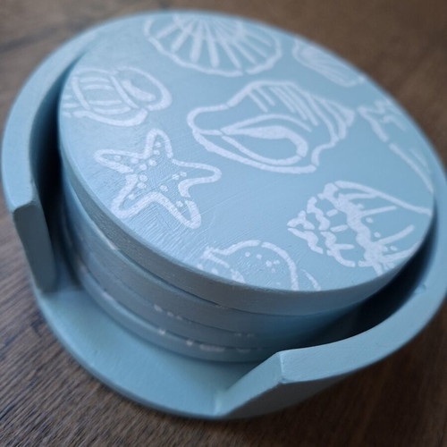 Handmade plaster coaster set with summer decoration and soft blue color