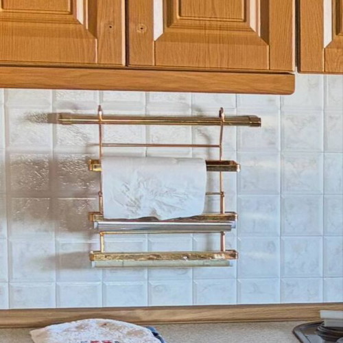 Gold metal kitchen rack like new with 3 holders for paper and foil