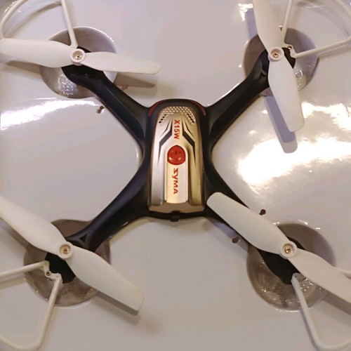 Syma X15W drone used with remote control and video mount