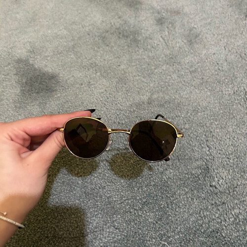 Round glasses used, black, with flawless lens