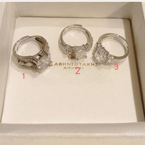 Galerie Tsangarakis rings with white sapphires like new, plated silver