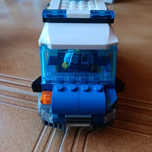 Lego set used with truck, helicopter, and motorcycle