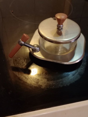 Cheese container new with stainless steel base and wooden handles