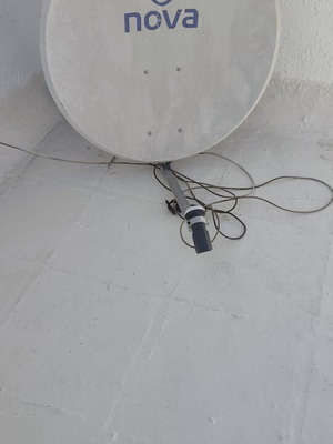 Satellite dish and LNB used with mounting base