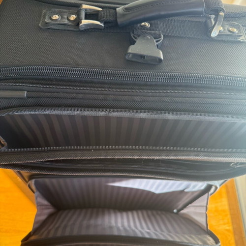 Delsey Black Medium Suitcase used with wheels