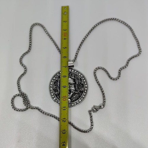 Medusa Pendant in Steel like new with rhinestones and chain