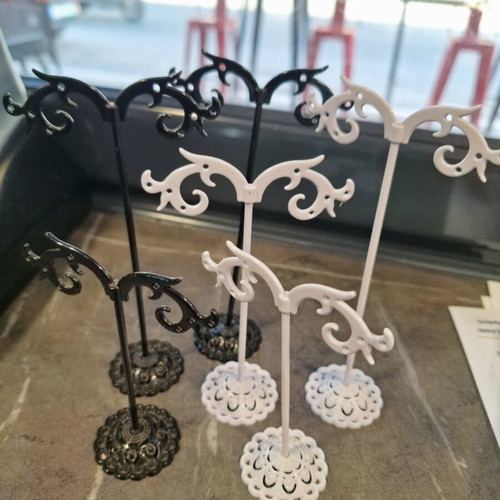 Earring stands, black and white