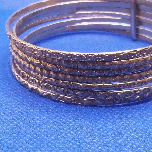 Metal bracelet with 7 rings used