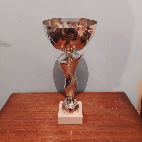 Trophy like new with metal, plastic, and marble parts