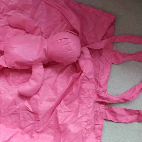 Fuchsia shoulder bag used for shopping with teddy bear pouch