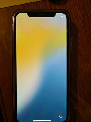 Iphone Xs black like new with 4 cases