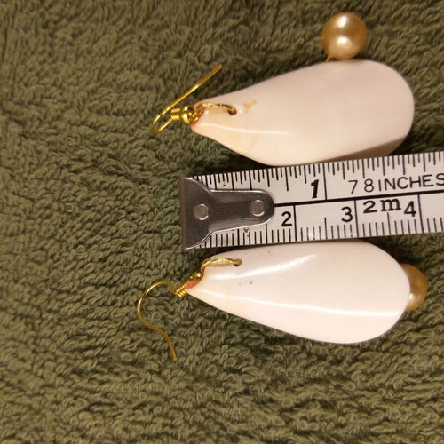Earrings with spiral shell and pearl