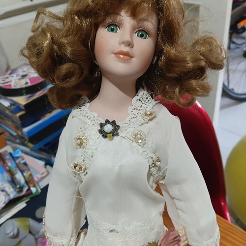 Porcelain doll in excellent condition