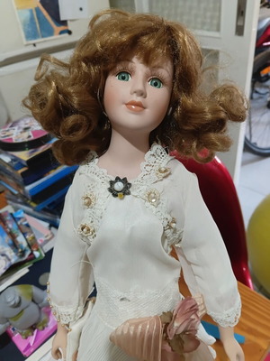 Porcelain doll in excellent condition