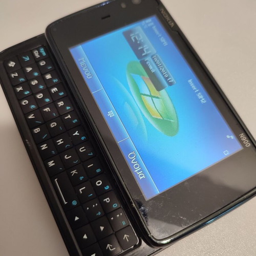 Nokia N-900 used, fully functional but does not charge, with charger