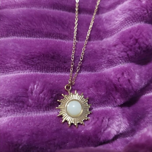 Steel pendant new, gold color with white stone