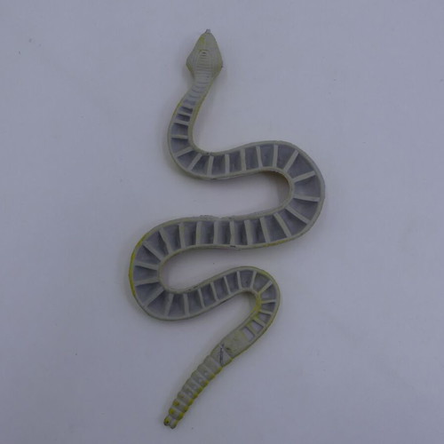 Plastic animal toys used, yellow snake