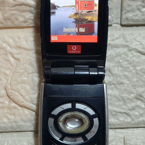 Sharp GX25 cell phone used blue with camera up to 7.9 MPixel
