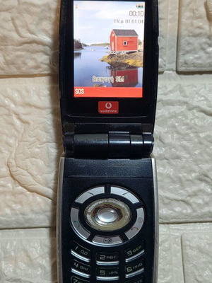 Sharp GX25 cell phone used blue with camera up to 7.9 MPixel