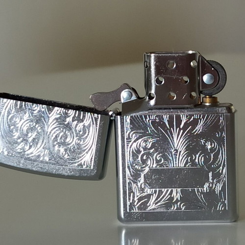 Zippo vintage lighter 2003, new, embossed design