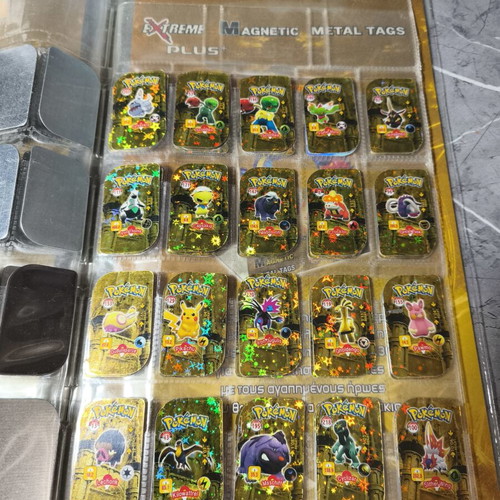 Pokemon metal tags used from collection pack