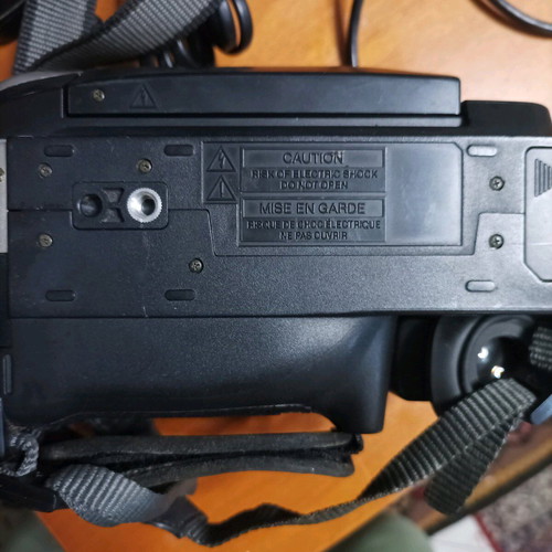 Hitachi video camera used with foldable screen and VHS cassette