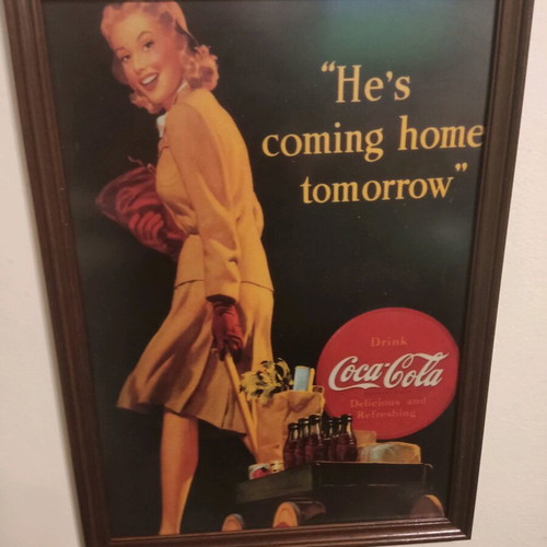 Coca Cola advertisement in wooden frame used