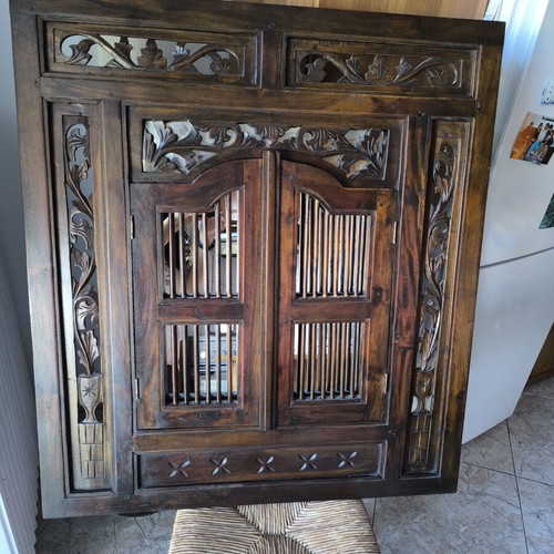 Wooden carved mirror with opening shutters like new