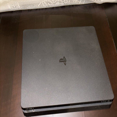 PlayStation 4 Slim used with controller and 7 games, 500GB