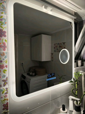 Smart bathroom mirror with LED lighting and Bluetooth