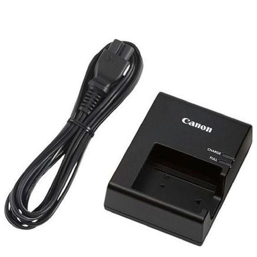 Canon EOS 2000D with 18-55mm lens, battery, charger, and gift bag like new