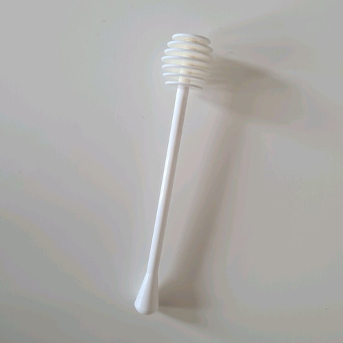 Honey spoon white plastic like new