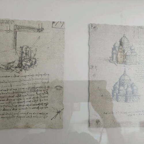 Various art prints and one banner like new with Da Vinci works