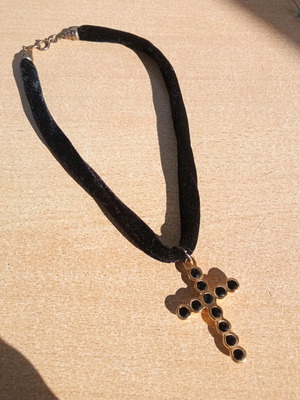 Cross used black gold