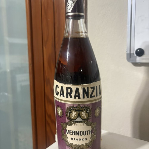 Vintage Garanzia Vermouth Bianco bottle used, sealed 1974