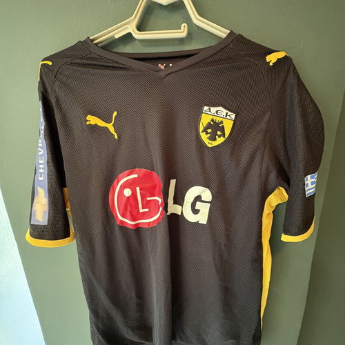 AEK football jersey from championship game, brown