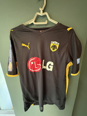 AEK football jersey from championship game, brown